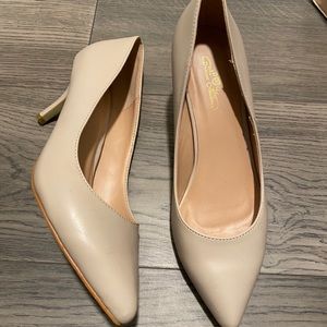 Nude colored pumps